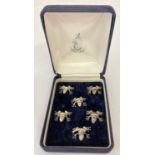 A set of 6 cased novelty silver frog shaped menu holders from Douglas Pell Silverware.