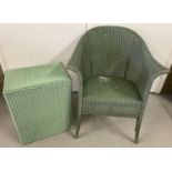 A vintage Lloyd loom style chair and matching linen basket, both painted green.