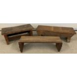 2 antique wooden bench style stools together with a vintage handmade wooden bench stool.