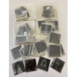 A collection 200 assorted photographic negatives of clothed glamour models.