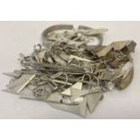 A bag of scrap silver pieces from a jewellery maker.