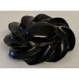 An Antique carved Whitby Jet brooch, approx 3.5cm x 5cm.