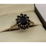 A 9ct gold and sapphire dress ring.