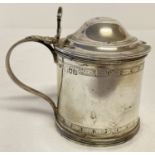 A Mappin & Webb, hallmarked silver, hinge lidded condiment pot with blue glass liner.