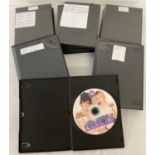 30 assorted adult erotic DVD's in plain plastic folding cases.