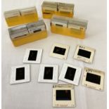 4 cases containing a quantity of assorted professional photographic negatives of nude models.