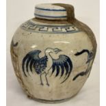 A hand painted Chinese ceramic blue and white lidded ginger jar with paper seal to lid.