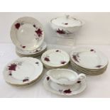 A Polish porcelain part dinner service by Cmeilow decorated with red roses.