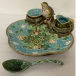 A 19th century Victorian Majolica strawberry dish with turquoise and brown glaze.