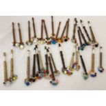 30 assorted beaded lacemaking bobbins with turned wooden & plastic handles.