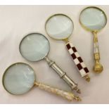 A collection of 4 large decorative handled magnifying glasses.