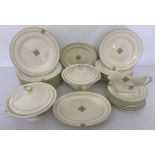 A collection of mid century Mintons Ceramic dinner ware in green & yellow patternation.