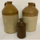 2 large vintage stoneware bottles with handles together with a small stone ware bottle with spout.