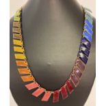 A hand crafted modern design multi coloured enamel necklace with magnetic clasp.
