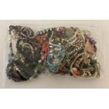 A sealed bag of mixed modern costume jewellery, to include bracelets and necklaces.