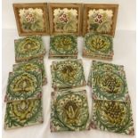 20 William De Morgan green and pink glaze floral design tiles in 5 different patterns.