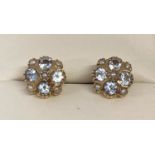 A pair of 9ct gold blue topaz and seed pearl stud earrings by Luke Stockley, London.