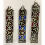 3 small leaded stained glass panels with leaf and vine decoration.