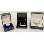 3 boxed items of silver and white metal jewellery.