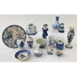 A collection of vintage and antique blue & white ceramics to include Delft and Copenhagen.