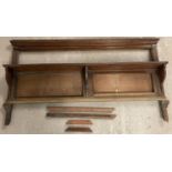 An Edwardian mahogany wall hanging shelf with plinth top. Originally contained ceramic tiles.