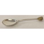 A Silver Jubilee silver spoon with crown finial by Mappin & Webb.