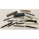 A collection of vintage pens and propelling pencils in varying sizes and conditions.