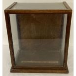 A vintage wooden framed, glass panelled display case