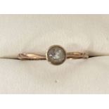 An antique 9ct rose gold and aquamarine solitaire dress ring.