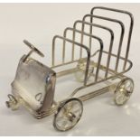 A novelty Van Bergh style silver plated toast rack in the form of a veteran car.