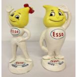 A pair of painted cast metal Esso money boxes in the shape of Andy & Abby Slick.