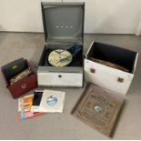 A vintage Bush Monarch portable record player (SRP.31D) together with 2 cases of vintage records.