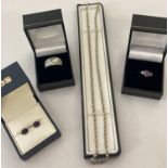 4 items of boxed silver jewellery.