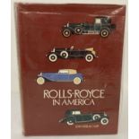 A 1975 copy of "Rolls-Royce In America" by John Webb de Campi.