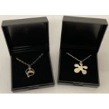 2 boxed modern design silver pendant necklaces.