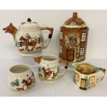 A vintage Portland Potteries 3 piece tea set with fox hunting design & fox head shaped spouts.