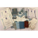 A collection of masonic items to include an apron, By-Law booklets, white gloves and certificates.