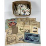 A box of vintage loose cigarette and tea cards. Together with a small collection of complete and