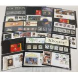 A collection of 11 mint Royal Mail collectors stamps sets or stamp books complete with corresponding