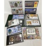 A folder containing 24 Millennium first day covers and 7 Christmas 2013 issue first day covers.