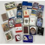 A box containing approx. 21 sets of playing cards in varying sizes and designs. To include