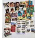 A collection of vintage bubble gum, cereal and trading cards. To include: Weetabix 3-D viewer,