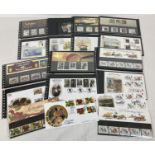 A collection of 12 Royal Mail mint collectors stamp sets and stamp books complete with corresponding