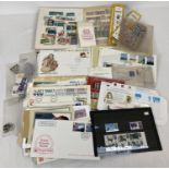 A box of assorted vintage stamps & ephemera. To include: First Day Covers, loose stamps, stamp stock