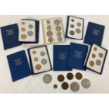 A George V 1935 half silver crown and other loose vintage British coins. Together with 9 sets of
