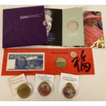 A collection of commemorative coins and bank notes. To include 2006 Queens 80th Birthday £5 coin