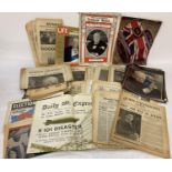 A box of assorted vintage newspapers & magazines to include covers featuring major world events.