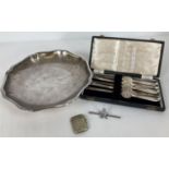 A small collection of silver plated items. A cased set of 5 shellfish forks, a fluted edged