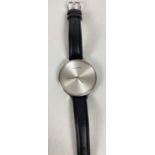 A ladies Georg Jenson stainless steel cased wristwatch with brushed steel sunray dial. Fixings