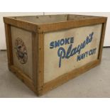 A vintage Player's Navy Cut Cigarettes wooden framed advertising distribution box.